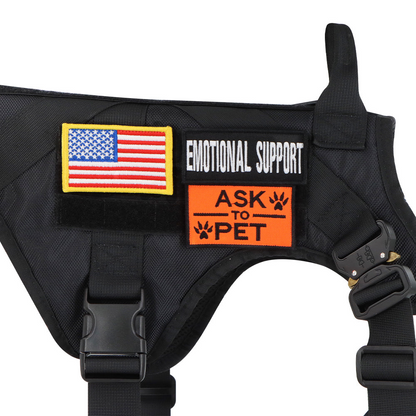 Black tactical harness displayed with attached service patches