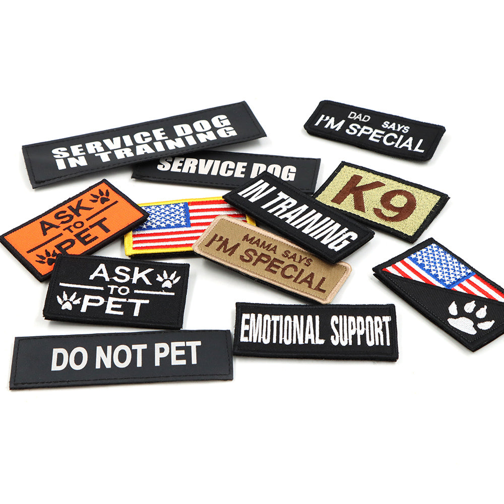 Assortment of hook-and-loop dog patches in different designs