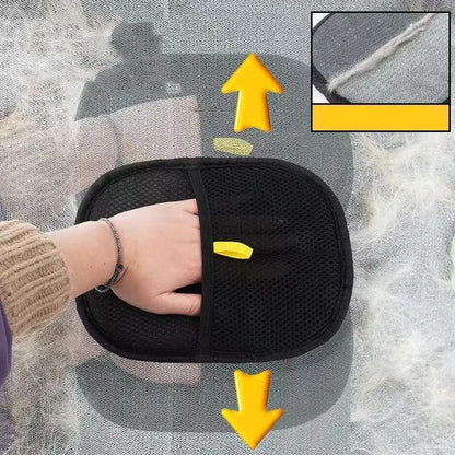 Hand using the glove to clean a car seat