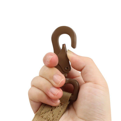 Close-up of the leash clip held in a hand